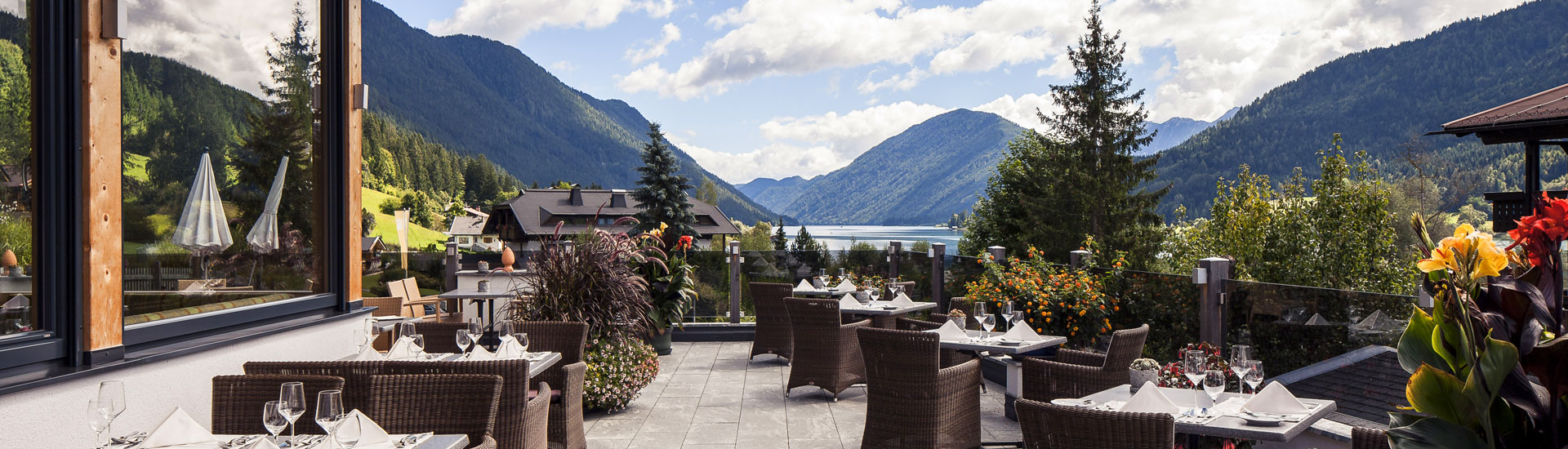 Seeterrasse Regitnig Urlaub und Ferien am Weissensee in modernen Chalets und Lodges am See.